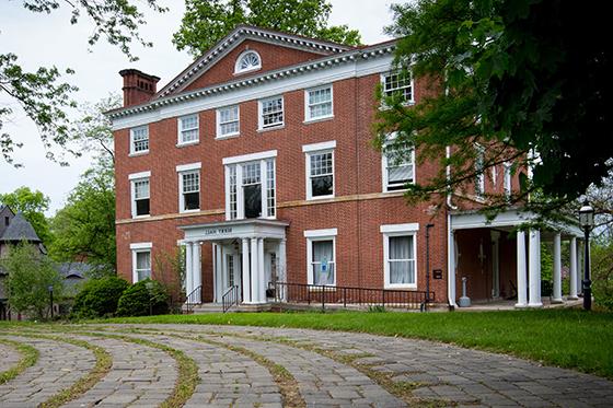 Photo of red brick Berry Hall on Chatham University's Shadyside Campus